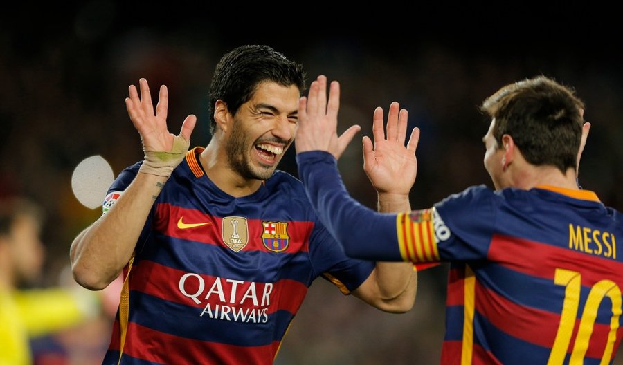 Luis Suarez ja Lionel Messi